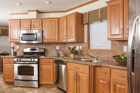 golden oak cabinets with stainless steel appliances|new oak cabinets.